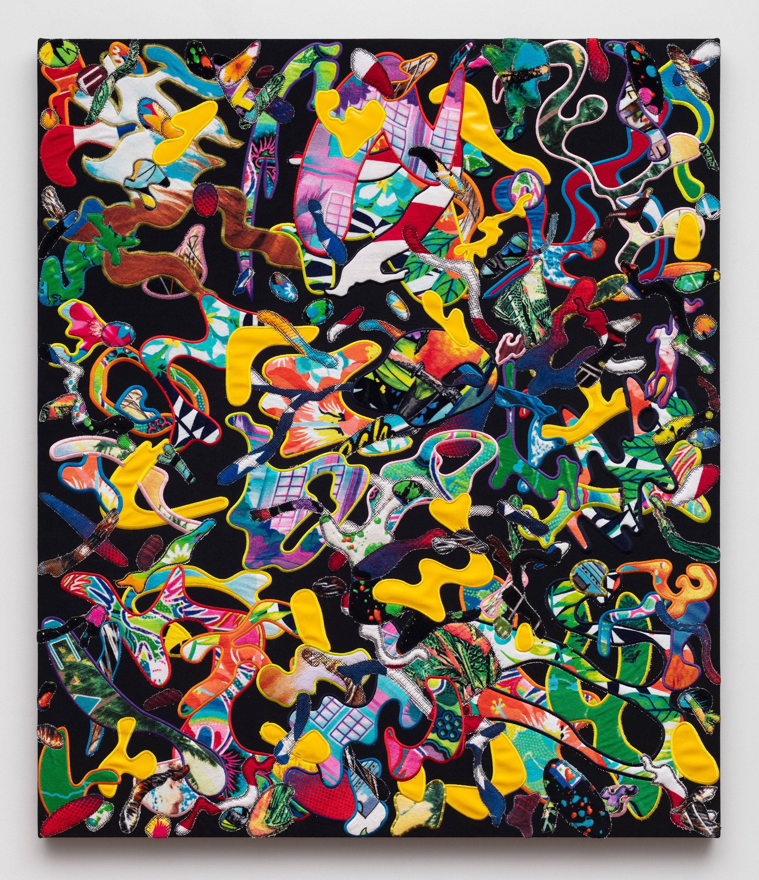 A black beach towel stretched on a canvas embroidered with squiggled designs in various colors and patterns.