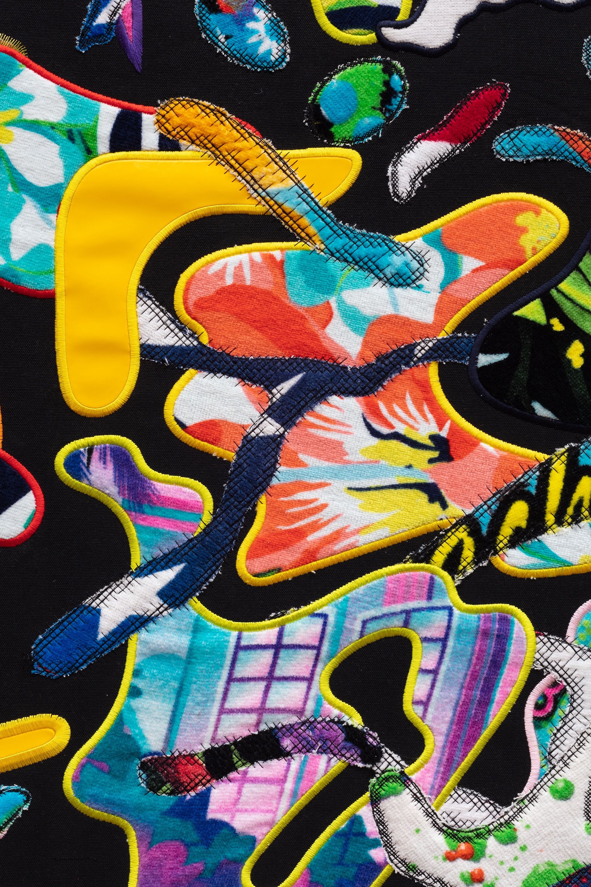 Detail image of the embroidered beach towel.