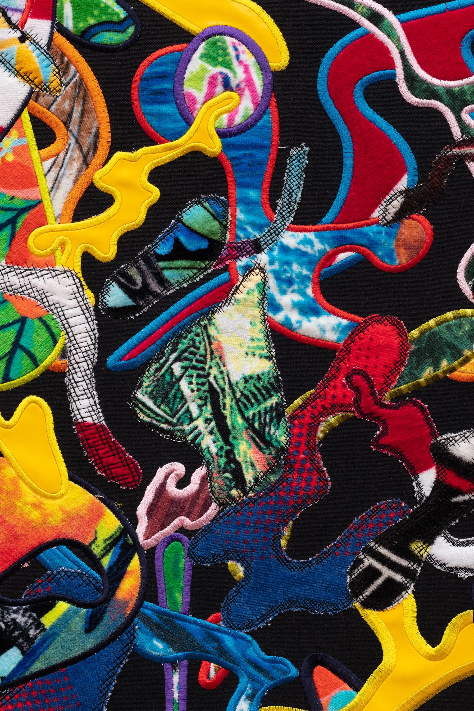 Detail image of the embroidered beach towel.